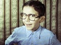 Smiling child with glasses in vintage clothes Royalty Free Stock Photo