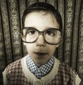 Smiling child with glasses in vintage clothes Royalty Free Stock Photo