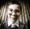 Smiling child with glasses in vintage clothes Royalty Free Stock Photo