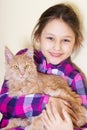 Smiling child and kitten Royalty Free Stock Photo