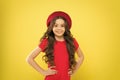 Smiling child. Little girl with long hair. Kid happy cute face adorable curly hair yellow background. Lucky and Royalty Free Stock Photo