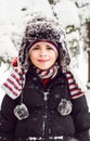 Smiling child in snowy day