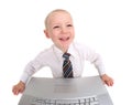 Smiling Child Working on a Laptop Computer Royalty Free Stock Photo