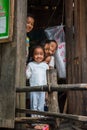 Smiling children in a Cambodian fishing village