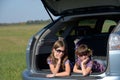 Smiling children in car Royalty Free Stock Photo