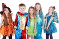 Smiling children in carnival costumes stand Royalty Free Stock Photo