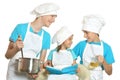 Smiling children in chef uniforms Royalty Free Stock Photo