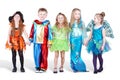 Smiling children dressed in carnival suits stand Royalty Free Stock Photo
