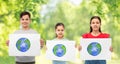 smiling children holding drawing of earth planet Royalty Free Stock Photo