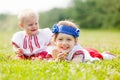 Smiling children in ukrainian folk clothes