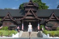 Chinese woman in front of Melaka sultanate palace museum malaysia