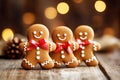 Smiling christmas gingerbread men on wooden background Royalty Free Stock Photo