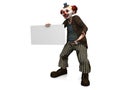Smiling clown holding blank sign. Royalty Free Stock Photo