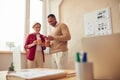 Smiling Colleagues Talking Office. Happy Business Couple Drinking Coffee Royalty Free Stock Photo