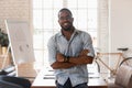 Smiling confident african american young businessman portrait.