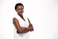 Smiling confident african american young woman standing with arms crossed Royalty Free Stock Photo