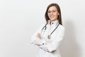 Smiling confident beautiful young doctor woman with stethoscope, glasses isolated on white background. Female doctor in medical Royalty Free Stock Photo