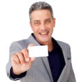 Smiling confident businessman holding a white card Royalty Free Stock Photo