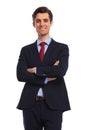Smiling confident businessman standing with arms folded Royalty Free Stock Photo