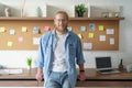 Smiling confident millennial business man look at camera at home office. Royalty Free Stock Photo