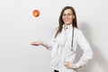 Smiling confident pretty young doctor woman with stethoscope, glasses isolated on white background. Female doctor in Royalty Free Stock Photo