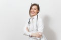 Smiling confident pretty young doctor woman with stethoscope, glasses isolated on white background. Female doctor in Royalty Free Stock Photo