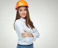 Smiling confident woman builder architect standing with crossed