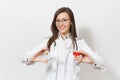 Smiling confident young doctor woman with stethoscope, glasses isolated on white background. Female doctor in medical Royalty Free Stock Photo