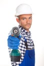 Smiling construction worker with drill isolated on white background Royalty Free Stock Photo