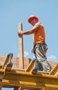 Smiling construction worker with formwork beam Royalty Free Stock Photo