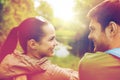 Smiling couple with backpacks in nature Royalty Free Stock Photo