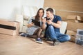 Smiling couple buying new furniture for their home Royalty Free Stock Photo