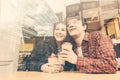 Smiling couple in a cafe in London