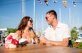 Smiling couple drinking champagne at cafe Royalty Free Stock Photo