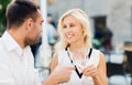 Smiling couple drinking champagne at cafe Royalty Free Stock Photo