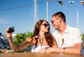 Smiling couple drinking champagne at cafe Royalty Free Stock Photo