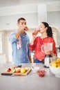 Smiling couple drinking fruit juice Royalty Free Stock Photo