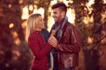 Couple enjoying in time at autumn park Royalty Free Stock Photo