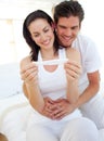 Smiling couple finding results of pregnancy test Royalty Free Stock Photo