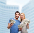 Smiling couple holding dollar cash money Royalty Free Stock Photo