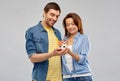 Smiling couple holding house model Royalty Free Stock Photo