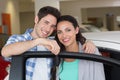 Smiling couple holding their new car key Royalty Free Stock Photo