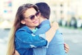 Smiling couple laughing and hugging in city Royalty Free Stock Photo