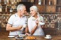 Couple looking at each other having breakfast Royalty Free Stock Photo