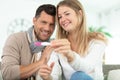 smiling couple looking at pregnancy test Royalty Free Stock Photo