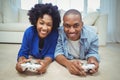 Smiling couple lying on the floor Royalty Free Stock Photo