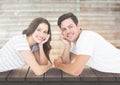 Smiling couple lying on jetty