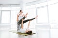 Smiling couple practicing acro yoga exercises Royalty Free Stock Photo