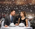Smiling couple at restaurant Royalty Free Stock Photo