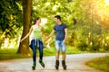 Smiling couple riding rollerblades Royalty Free Stock Photo